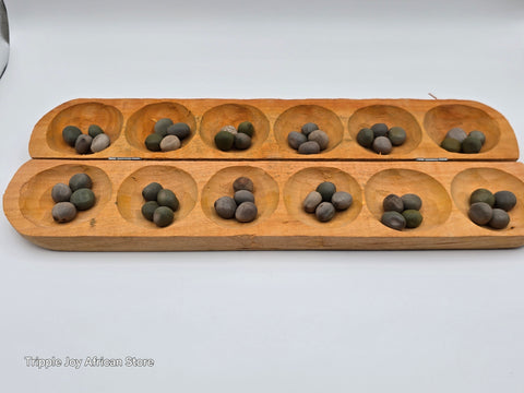 Ayo olopon wooden board game with seeds