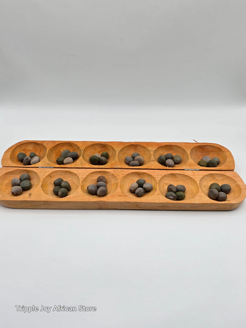 Ayo olopon wooden board game with seeds